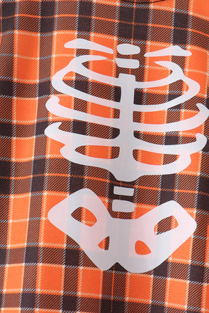 Orange skeleton plaid romper