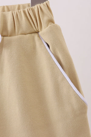 Khaki scallop hem bow skort