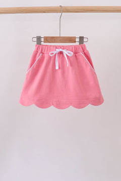 Deep pink scallop hem bow skort