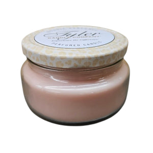 Bless Your Heart 11oz two-wick Tyler Candle Company candle in a pink jar with a leopard-pattern lid.