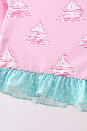 Pink sailboat print ruffle rashguard set