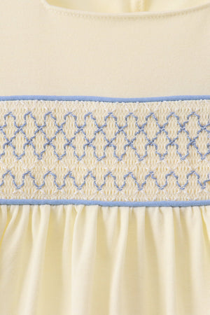 Cream smocked ruffle dress