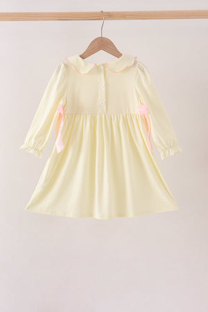 Cream smocked bow dress