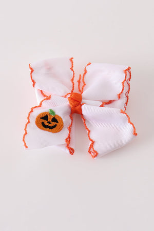 Orange Jack-O-Lantern embroidery crochet edge hair bow