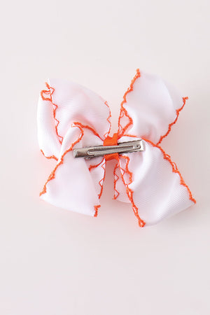 Orange Jack-O-Lantern embroidery crochet edge hair bow
