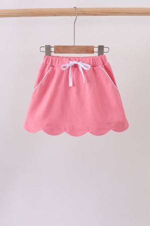 Deep pink scallop hem bow skort