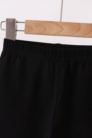 Black icing ruffle pants