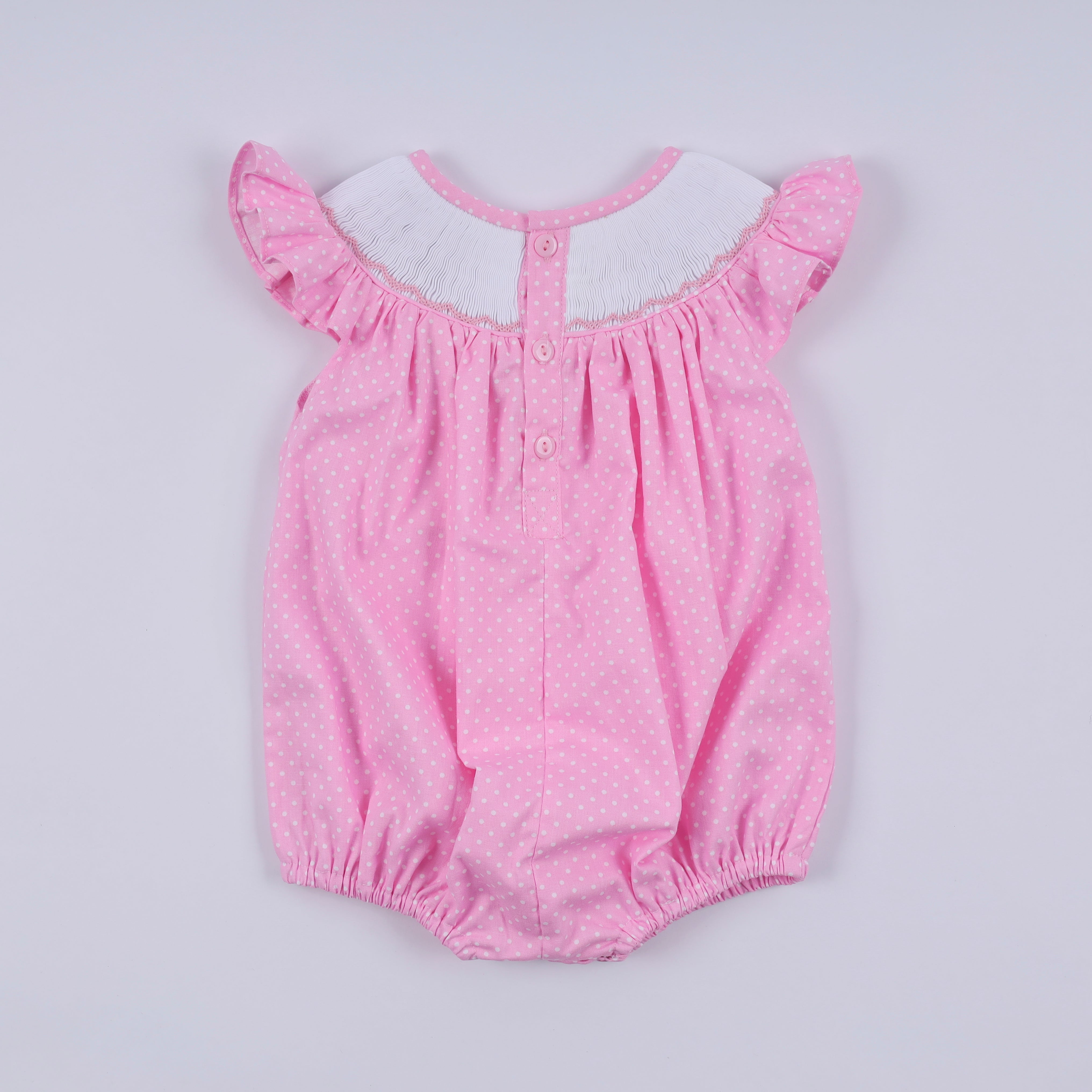 Pink character hand smocked dot ruffle bubble