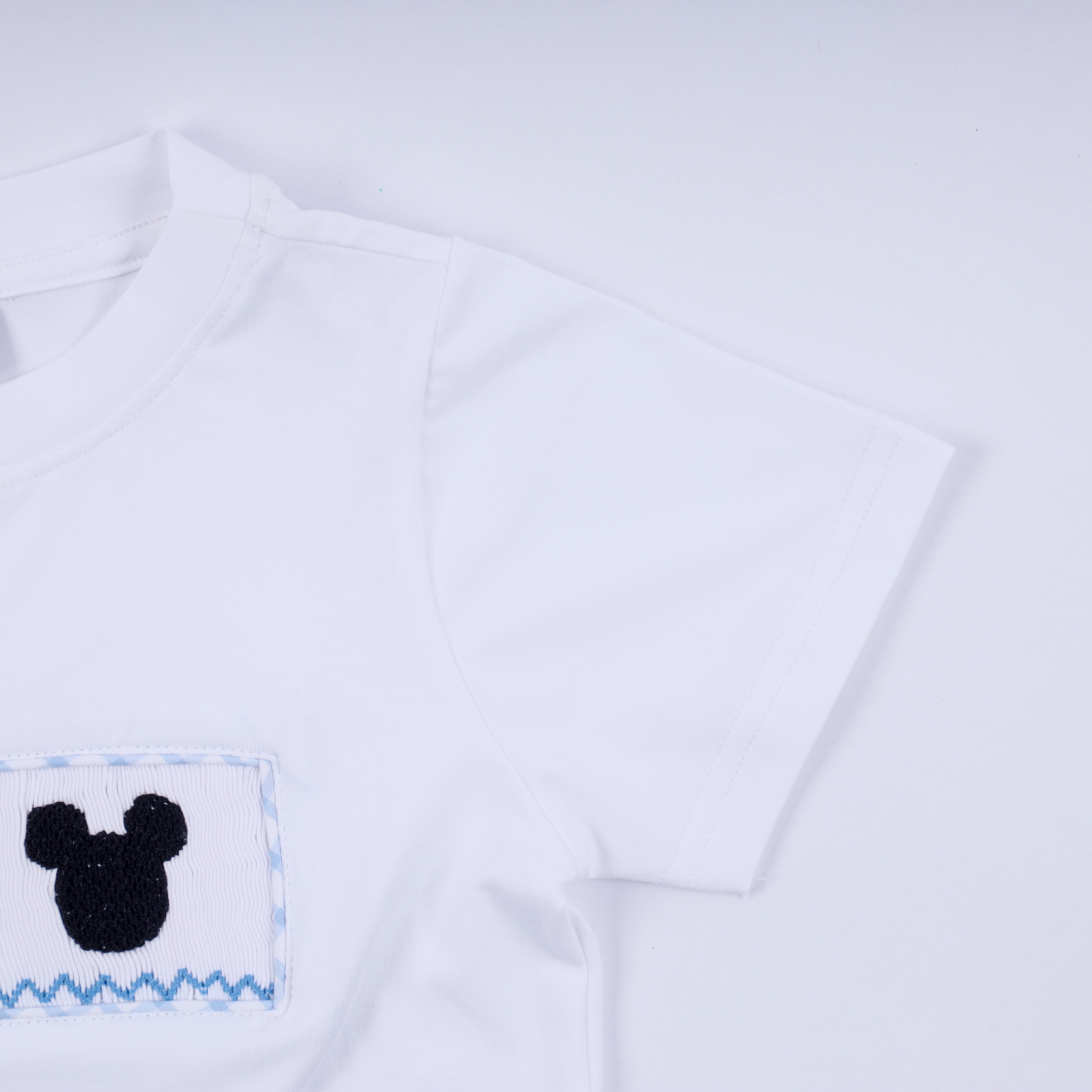 Blue character hand smocked gingham shorts set