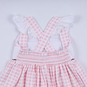 Pink character hand smocked gingham ruffle dress