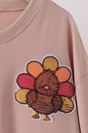 Khaki turkey sequin mom top