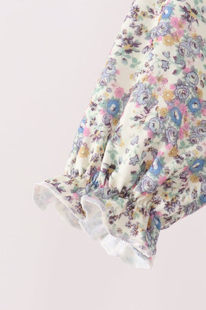 Blue floral smocked jumpsuit