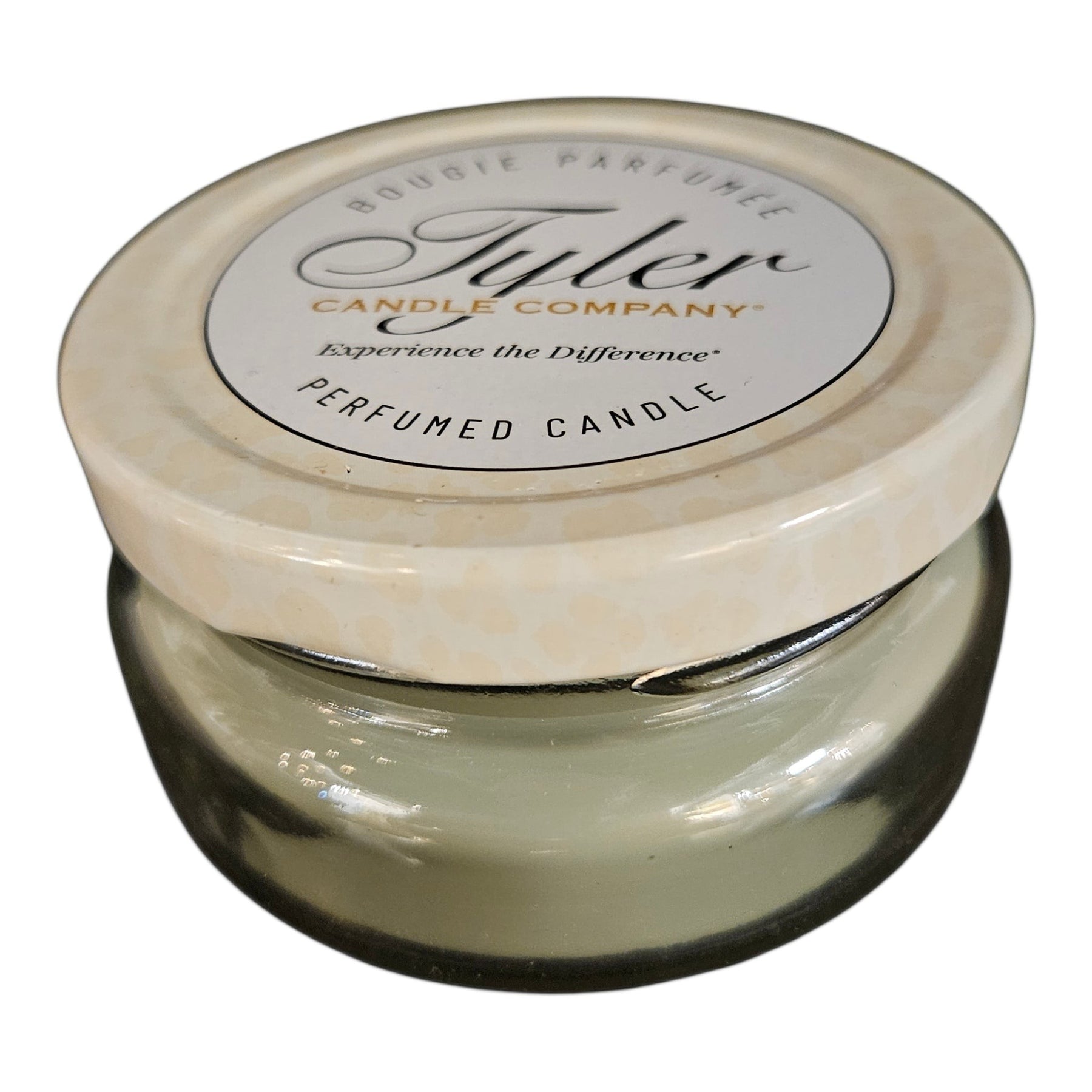 Purple Turtle Gifts 3.4oz Tyler Candle Company Hippie Chick perfumed candle in glass jar with cream lid.